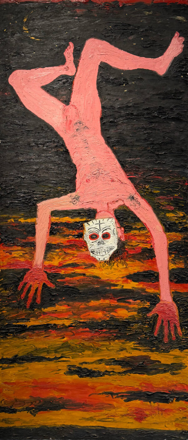 Man falling wearing Mexican mask